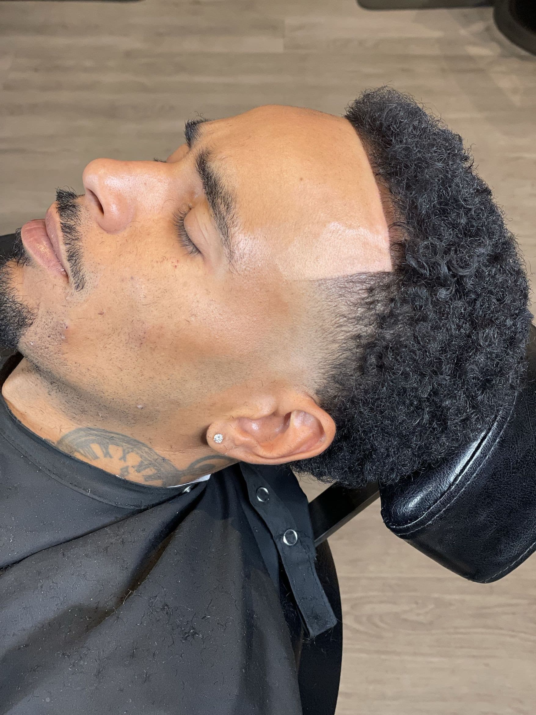 High-top fade with sharp temple lineup